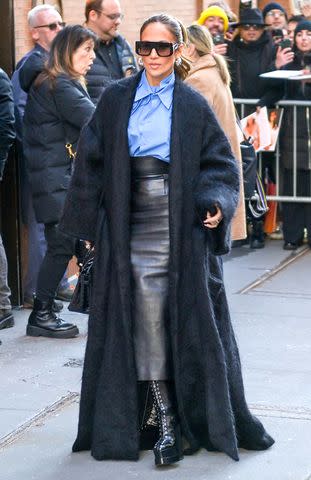 <p>METROPOLIS/Bauer-Griffin/GC</p> Jennifer Lopez wears black-and-blue ensemble in New York City on Feb. 15, 2024