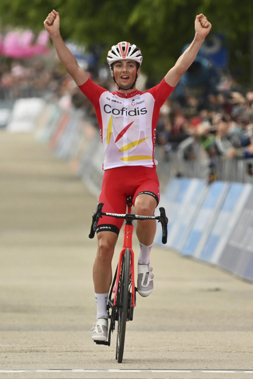 France's Viktor Lafay celebrates winning the eighth stage of the Giro d'Italia cycling race, from Foggia to to Guardia Sanframondi, Italy, Saturday, May 15, 2021. (Massimo Paolone/LaPresse via AP)