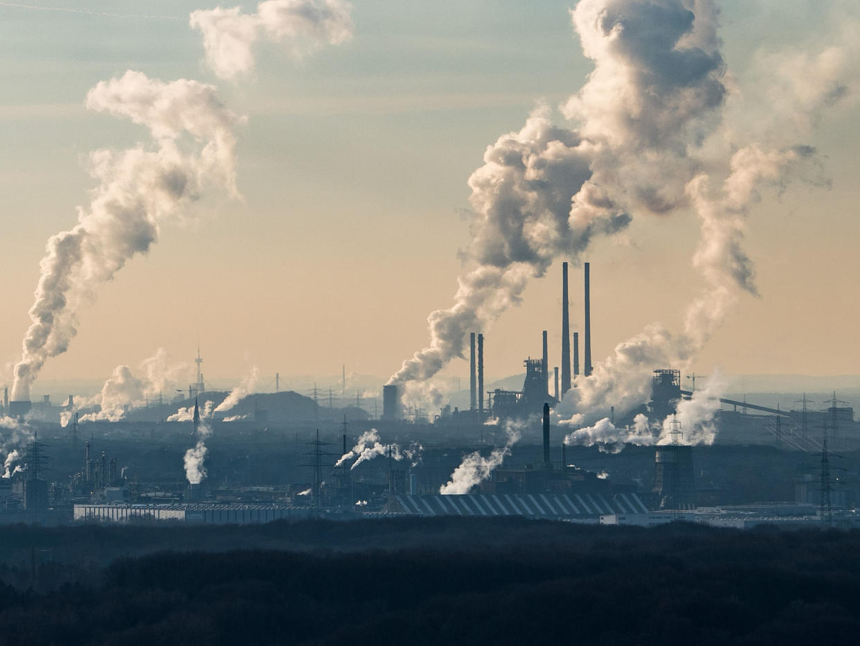 Steam and exhaust rise from the chemical company Oxea and the coking plant KBS Kokereibetriebsgesellschaft Schwelgern GmbH on a cold winter day: Getty Images