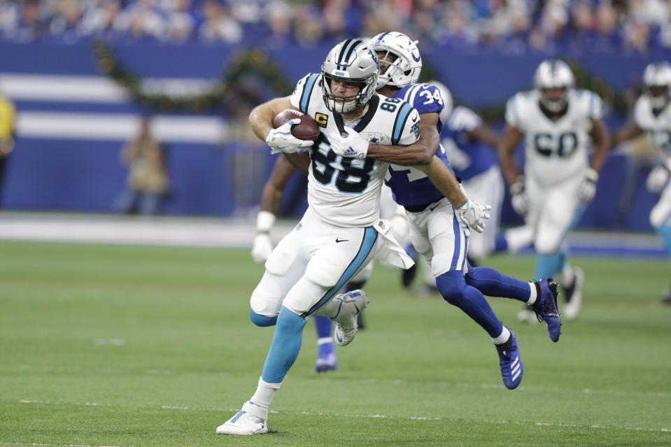 Carolina Panthers' Greg Olsen (88) is tackled by Indianapolis Colts' Rock Ya-Sin (34) during the first half of an NFL football game, Sunday, Dec. 22, 2019, in Indianapolis. (AP Photo/Michael Conroy)