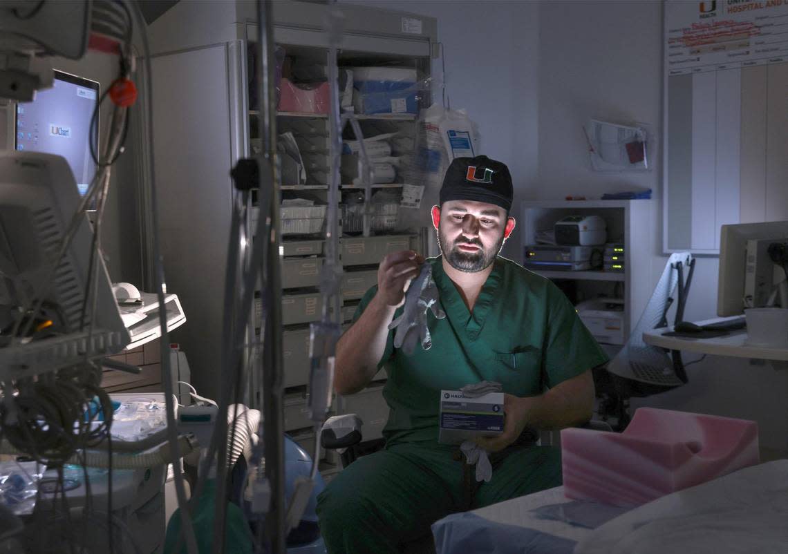 Dr. Miguel Escanelle, who attended the Medical Scholars program at the University of Miami Miller School of Medicine, in an operating room at UHealth System on Sept. 12, 2022. Escanelle, who came to the U.S. from Cuba when he was a teen, is a resident cardiac anesthesiologist.