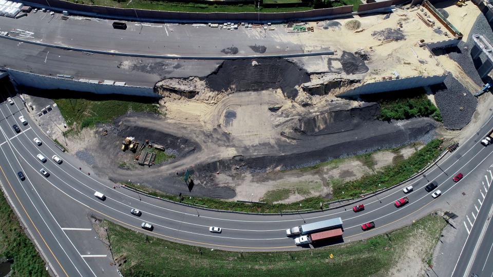 A collapsed section of a ramp under construction adjacent to the RT 42 to Rt 295 north ramp is shown in this drone view Thursday, June 24, 2021.