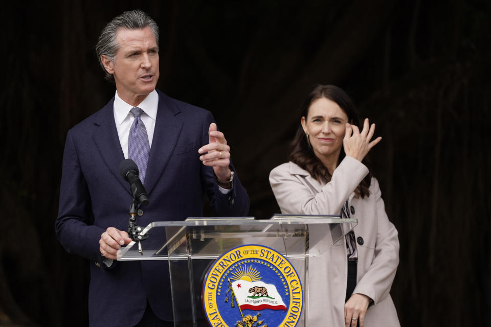 California Gov. Gavin Newsom and New Zealand Prime Minister Jacinda Ardern take questions after an event at the San Francisco Botanical Garden in San Francisco, Friday, May 27, 2022. Newsom met with Ardern in Golden Gate Park "to establish a new international partnership tackling climate change." (AP Photo/Eric Risberg)