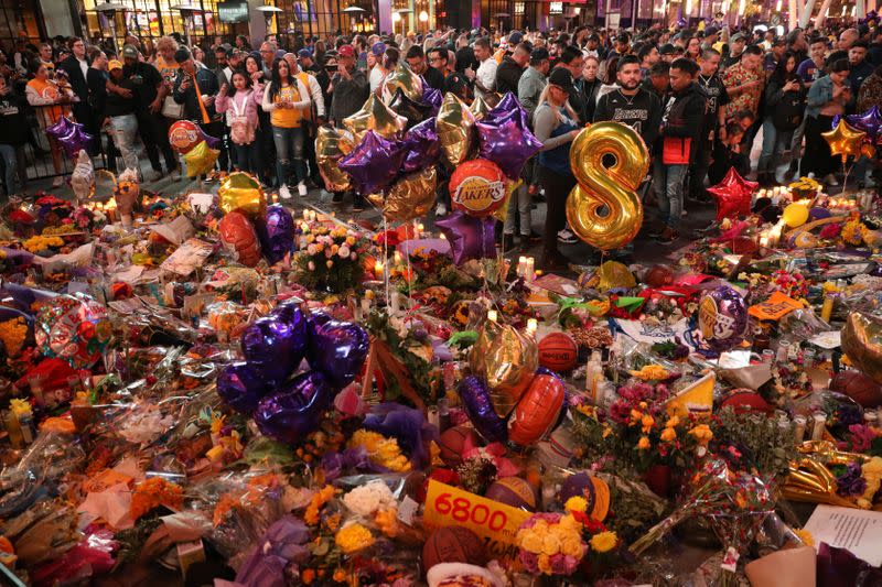 Mourners gather outside Staples Center before a Los Angeles Lakers home game to pay respects to Kobe Bryant