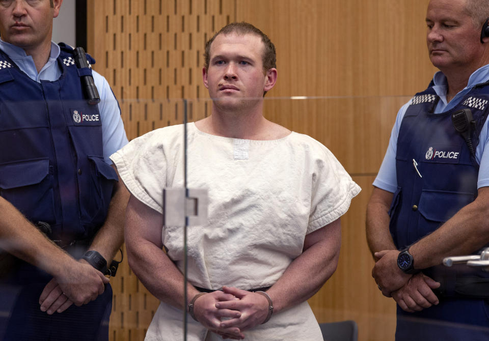 FILE - In this Saturday, March 16, 2019, file photo, Brenton Tarrant, the man charged in relation to the Christchurch mosque shootings, appears in the Christchurch District Court, in Christchurch, New Zealand. One year after killing 51 worshipers at two Christchurch mosques, Tarrant, an Australian white supremacist accused of the slaughter on Thursday, March 26, 2020, changed his plea to guilty. (Mark Mitchell/Pool via AP, File)
