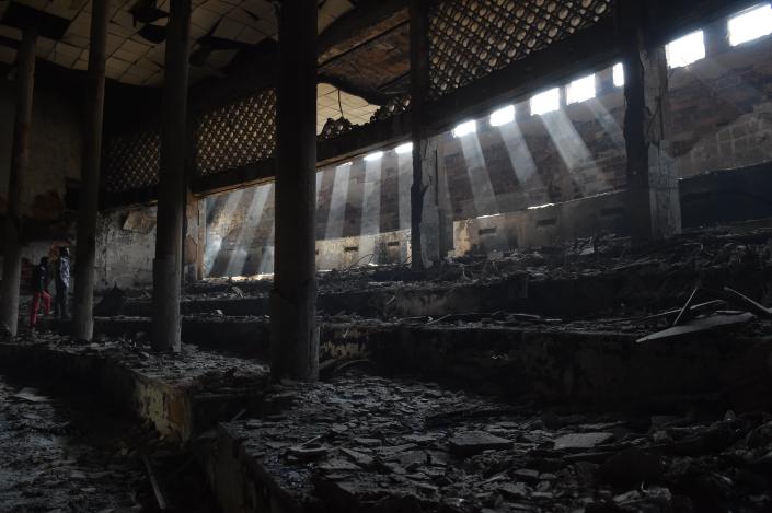 The burnt inside of the parliament in Ouagadougou pictured on October 31, 2014, a day after it was stormed by protesters (AFP Photo/Issouf Sanogo)
