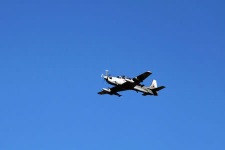 An Afghan Air Force A-29 attack aircraft flies during an exercise at a bombing range outside Kabul, Afghanistan, October 18, 2016. REUTERS/Josh Smith