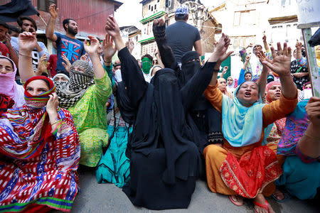 Women attend a demonstration in Srinagar against the killing of English lecturer, Shabir Ahmad, whom they say was killed by members of the security forces following weeks of violence in Kashmir August 18, 2016. REUTERS/Cathal McNaughton