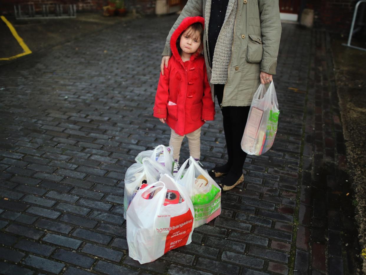 <p>There are 600,000 more children in poverty today than back in 2012</p> (Getty)