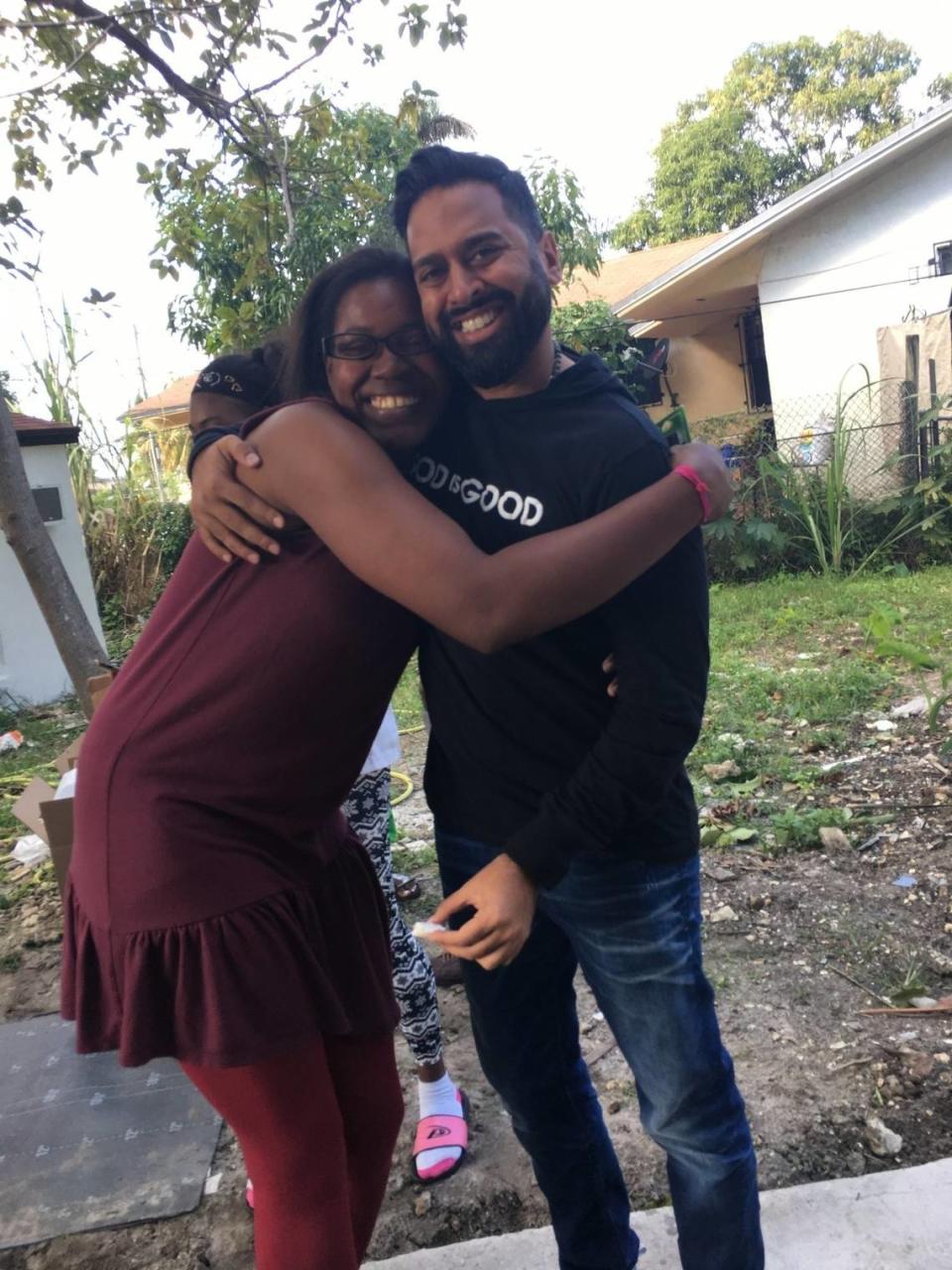 Ricky Patel and Juany Martinez, the mother of a patient at Nicklaus Children’s Hospital. Patel, the board chair of the Nicklaus Children’s Hospital Foundation, had more than 1,000 Christmas toys delivered to a block party in Little Haiti during the 2020 holidays.  He also donated a $250 gift card to Martinez to buy food.