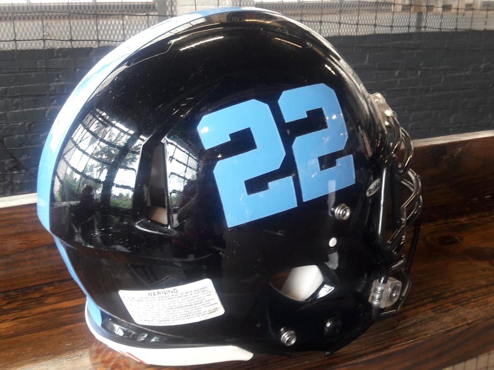 A Ribault High School football helmet is displayed during a press conference for the Bold City Showcase on July 22, 2021. [Clayton Freeman/Florida Times-Union]