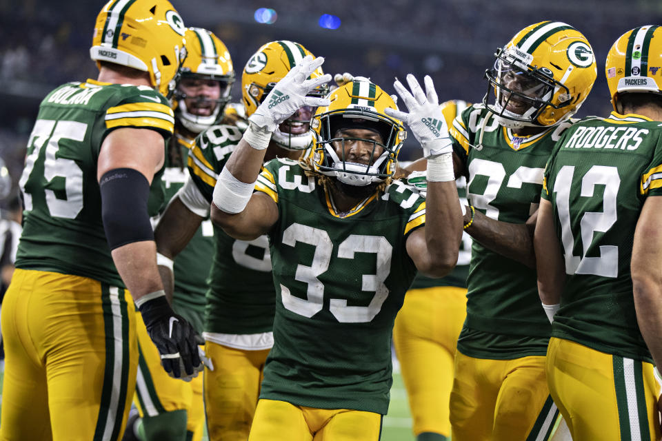 Aaron Jones of the Green Bay Packers celebrates after scoring his fourth touchdown against Dallas. (Getty Images)