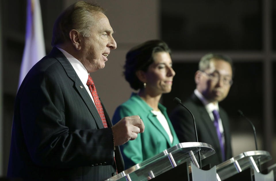 Rhode Island gubernatorial candidates, from the left to right, former state Rep. Joseph Trillo, who is running as an independent, Democratic Gov. Gina Raimondo, and Republican Cranston Mayor Allan Fung participate in a televised debate, Thursday, Sept. 27, 2018, in Bristol, R.I. (AP Photo/Steven Senne)