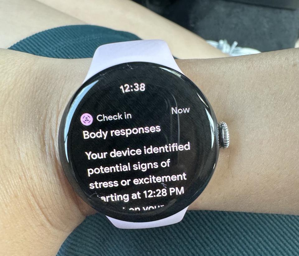 The Pixel Watch 3 on a wrist, with an alert on its screen saying 