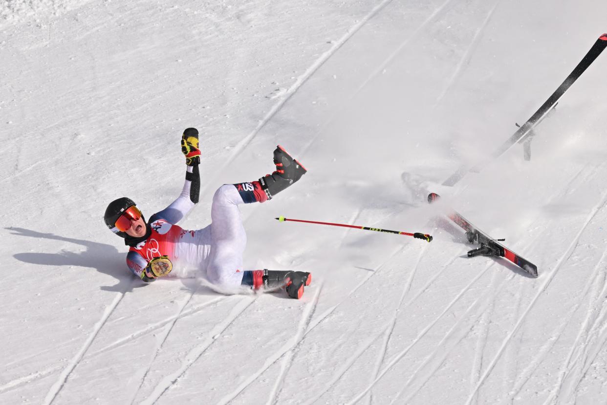 TOPSHOT - USA's Nina O'Brien falls in the second run of the women's giant slalom during the Beijing 2022 Winter Olympic Games at the Yanqing National Alpine Skiing Centre in Yanqing on February 7, 2022. (Photo by Joe KLAMAR / AFP) (Photo by JOE KLAMAR/AFP via Getty Images)