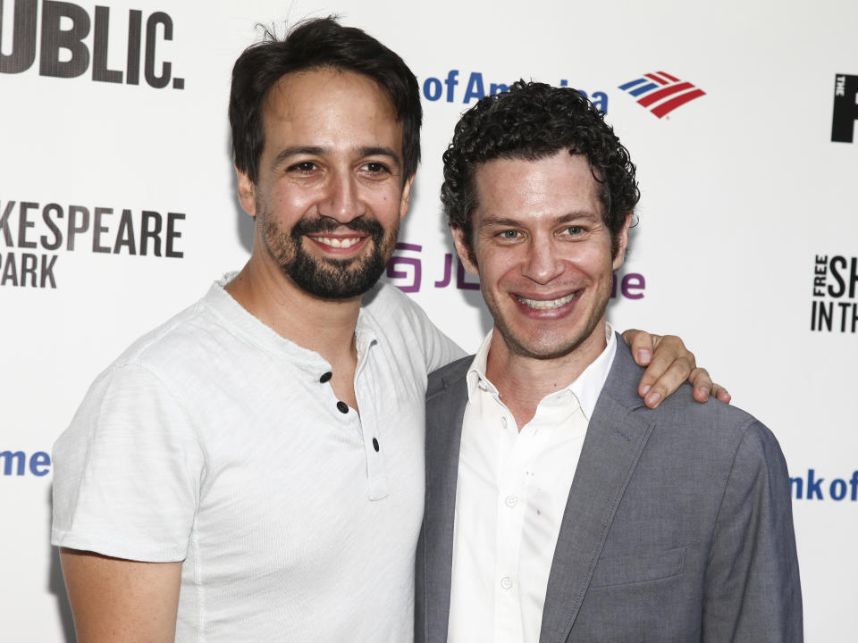 FILE - In this July 31, 2018 file photo, Lin-Manuel Miranda, left, and Thomas Kail attend the opening night of the Shakespeare in the Park production of Public Works' "Twelfth Night" in New York. A filmed version of Kail and Miranda's original Broadway production "Hamilton" will be available Friday, July 3, on Disney Plus. (Photo by Andy Kropa/Invision/AP, File)