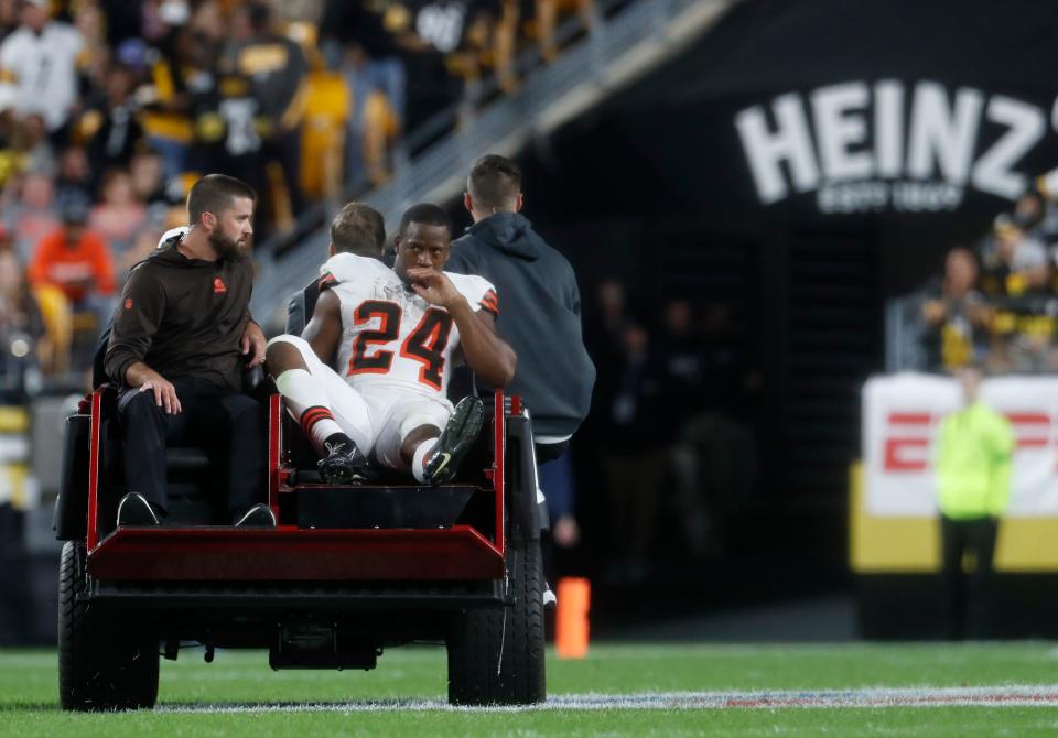 Cleveland Browns running back Nick Chubb (24) is taken from the field on a cart after suffering a knee injury against the Pittsburgh Steelers Monday night in Pittsburgh.