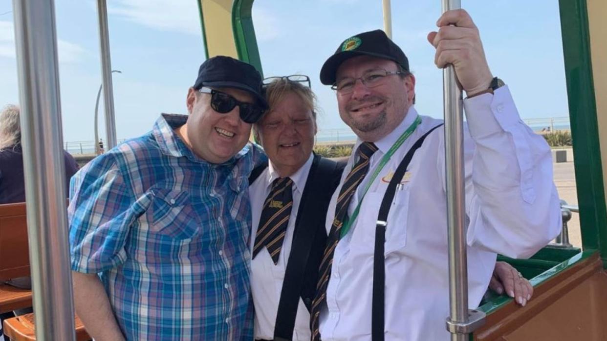 Comedian Peter Kay poses for a photo on a tram in Blackpool