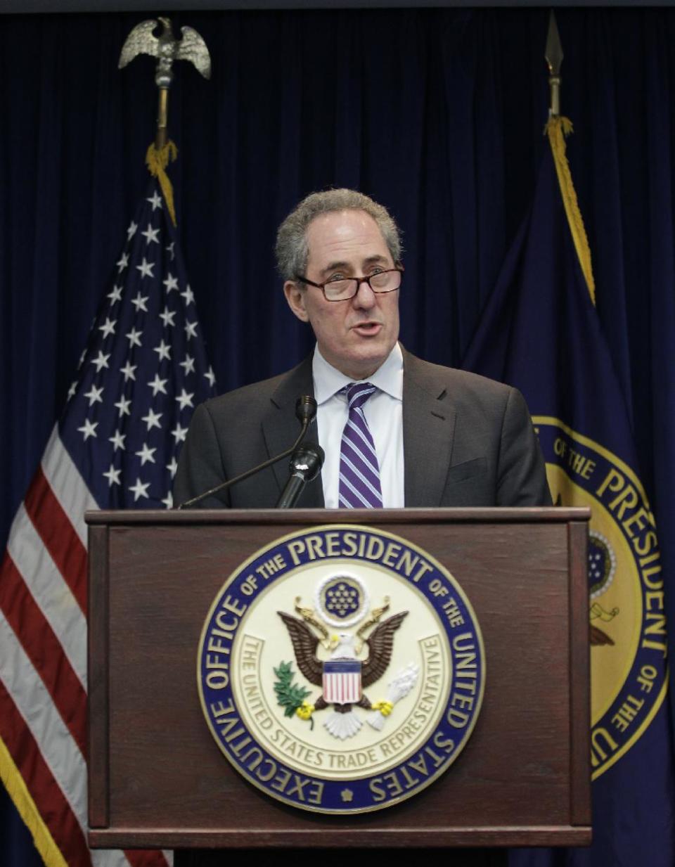 U.S. Trade Representative Michael Froman announces a trade enforcement action related to India, Feb. 10, 2014, during a news conference at the US Trade Representative's office in Washington.(AP Photo/Luis M. Alvarez)