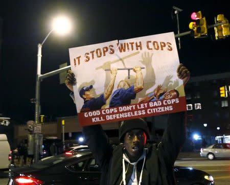 File photo of a man protesting on the streets of the Penn North section in Baltimore December 16, 2015. REUTERS/Gary Cameron