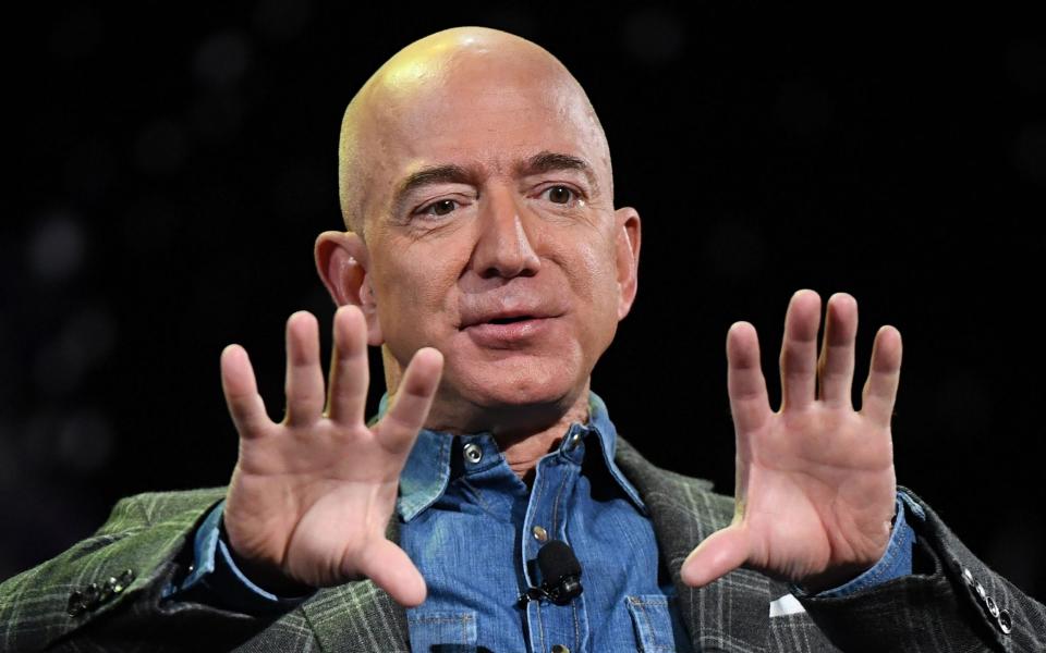 Amazon has claimed President Trump interfered in the JEDI contract process due to his public feud with CEO Jeff Bezos - AFP