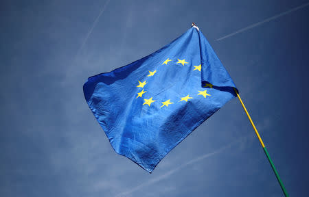 An EU flag flutters outside the Houses of Parliament, as uncertainty over Brexit continues, in London, Britain May 15, 2019. REUTERS/Hannah Mckay