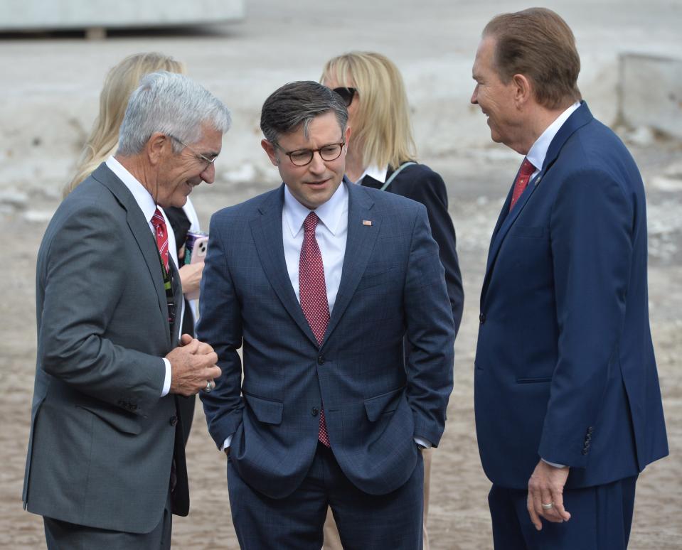 House Speaker Mike Johnson, center, is accompanied by Sarasota Bradenton International Airport CEO Rick Piccolo, left, and Rep. Vern Buchanan, right, on a Nov. 27 tour of the terminal expansion project.