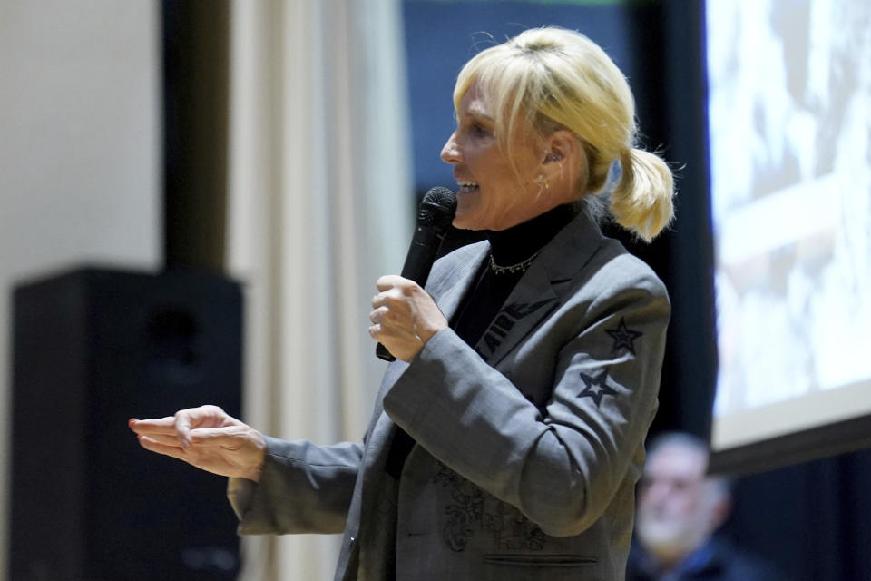 Activist Erin Brockovich speaks during a town hall meeting at East Palestine High School concerning the Feb. 3 Norfolk Southern freight train derailment in East Palestine, Ohio, Friday, Feb. 24, 2023. (AP Photo/Matt Freed)