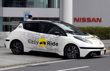 A self-driving vehicle, based on Nissan Leaf electric vehicle (EV), for Easy Ride service, developed by Nissan and mobile gaming platform operator DeNA Co, is seen during its media preview in Yokohama, Japan, February 21, 2018. Picture taken February 21, 2018. REUTERS/Toru Hanai