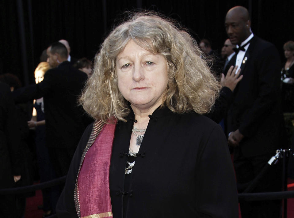 FILE - In this Feb. 27, 2011 file photo, costume designer Jenny Beavan arrives at the 83rd Academy Awards in the Hollywood section of Los Angeles. Beavan designed the costumes for the film "Cruella." (AP Photo/Matt Sayles, File)