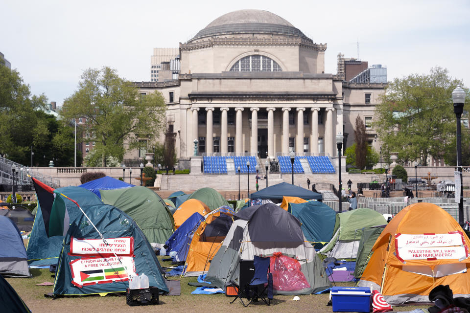 Student protesters camp on the campus of Columbia University, Tuesday, April 30, 2024, in New York. Early Tuesday, dozens of protesters took over Hamilton Hall, locking arms and carrying furniture and metal barricades to the building. Columbia responded by restricting access to campus. (Pool Photo/Mary Altaffer)
