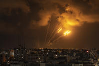 FILE - Rockets fired by Palestinian militants toward Israel, in Gaza City, Saturday, Aug. 6, 2022. (AP Photo/Fatima Shbair, File)