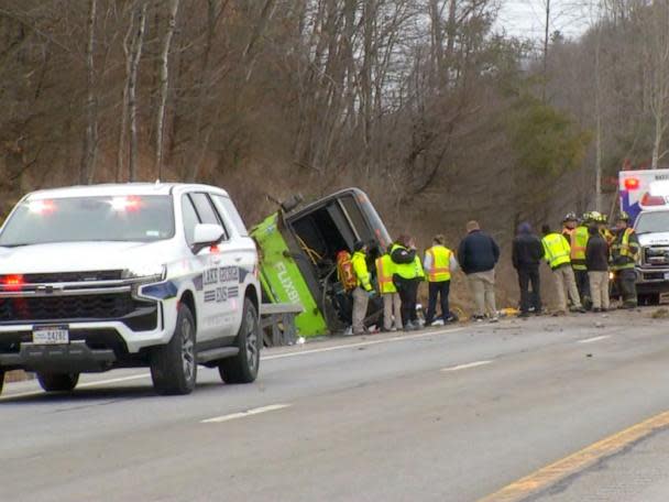 At least 1 dead nearly two dozen injured after tour bus rolls