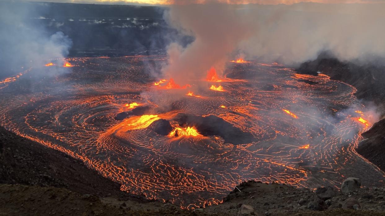  Lava and smoke coming out of a volcano 