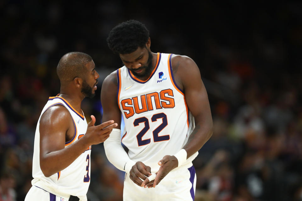 Chris Paul and Deandre Ayton are no longer the supporting cast for a contender in Phoenix. (Mark J. Rebilas/USA Today Sports)