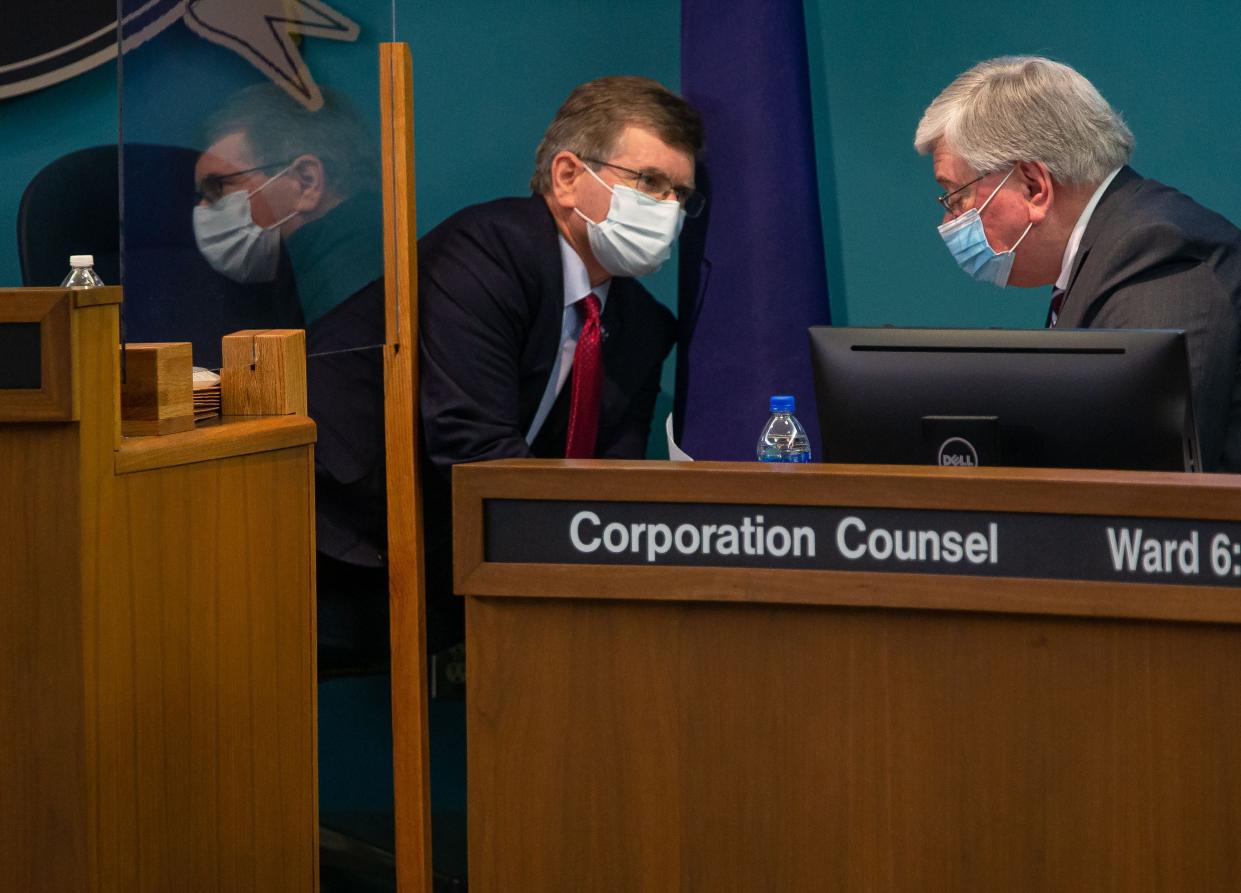 Springfield Mayor Jim Langfelder speaks with Corporation Counsel Jim Zerkle prior to discussion for the City of Springfield’s Fiscal Year 2022 budget during a special City Council meeting in the council chambers in Springfield, Ill., Tuesday, February 23, 2021. [Justin L. Fowler/The State Journal-Register] 