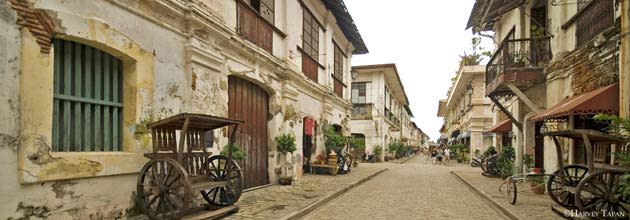 The Historic Town of Vigan<br><br>Longganisa (pork sausage links). Bagnet (deep fried pork belly). Empanadas (stuffed pastry). Oh, and tons of old-world landmarks that would make you want to don a Filipiñana costume and explore the town via calesa (horse-drawn carriage). The capital of Ilocos Sur, Vigan is the best-preserved planned Spanish colonial town in Asia, and a standing historical landmark of what the old East and Southeast Asian trading towns looked like.