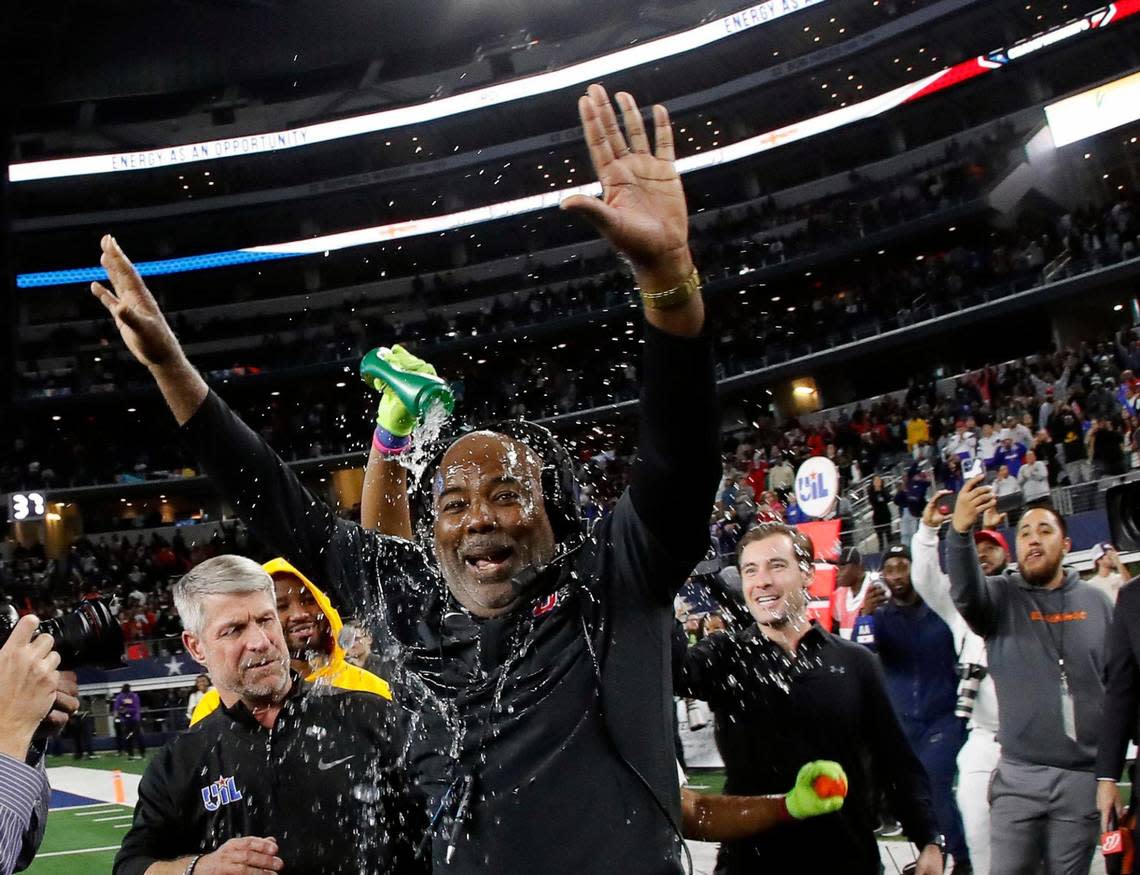 Duncanville head coach Reginald Samples celebrates his teams UIL Class 6A D1 state championship football game at AT&T Stadium in Arlington, Texas, Saturday, Dec. 16, 2022. Duncanville defeated Galena Park North Shore 28-21. (Star-Telegram Bob Booth)