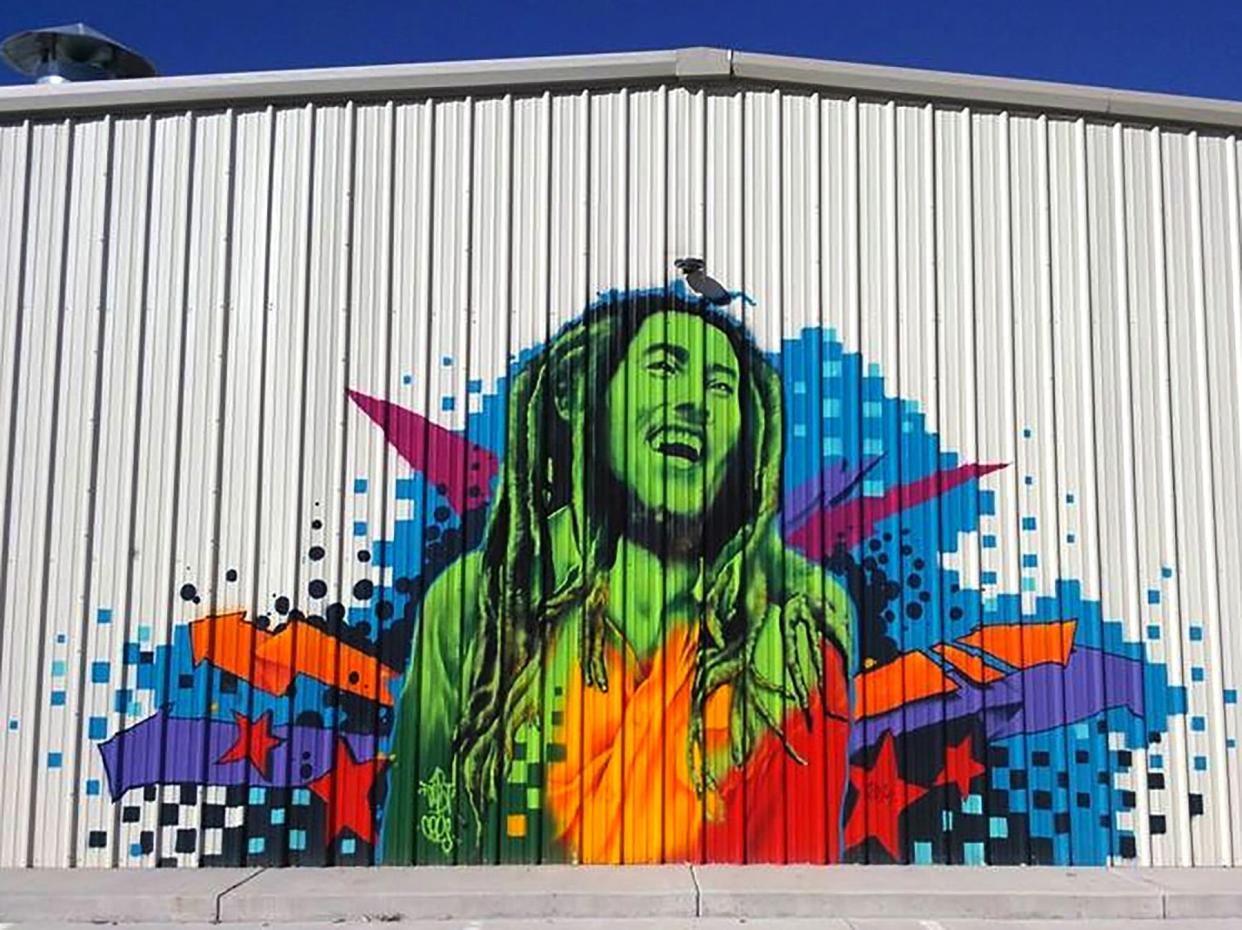 The Spot 420 retail marijuana dispensary at 748 E. Industrial in Pueblo West, pictured here with a Bob Marley mural, will be closing as a part of Curaleaf's departure from Colorado.