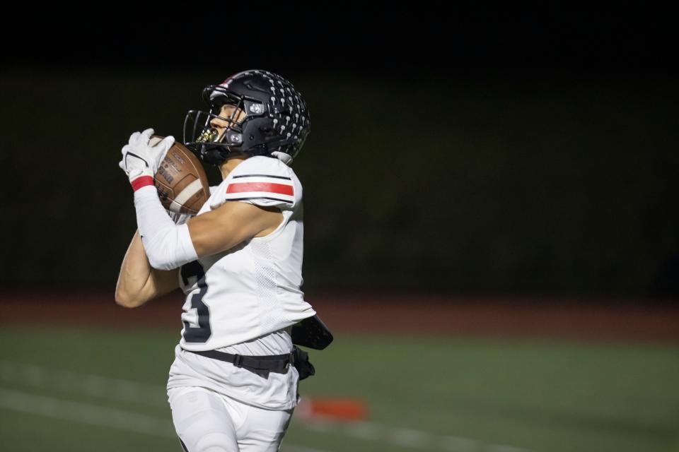 North Salem's Erick Gonzalez (3) catches a touchdown during the second quarter against Liberty at Wilsonville High School on Nov. 18.