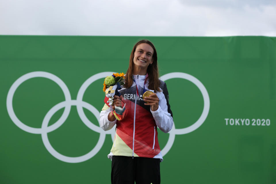 TOKYO, JAPAN - JULY 27: Gold medalist Ricarda Funk of Team Germany celebrates during the medal ceremony following the Women's Kayak Slalom Final on day four of the Tokyo 2020 Olympic Games at Kasai Canoe Slalom Centre on July 27, 2021 in Tokyo, Japan. (Photo by Adam Pretty/Getty Images)