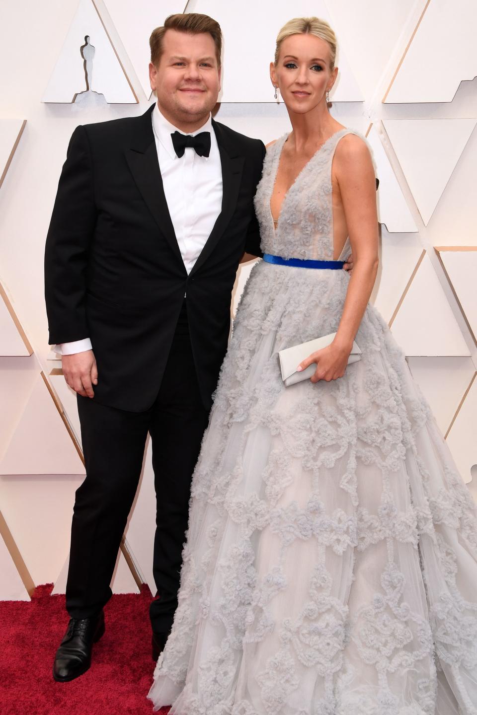 English actor and TV host James Corden (L) and wife Julia Carey arrive for the 92nd Oscars at the Dolby Theatre in Hollywood, California on February 9, 2020. (Photo by Robyn Beck / AFP) (Photo by ROBYN BECK/AFP via Getty Images)