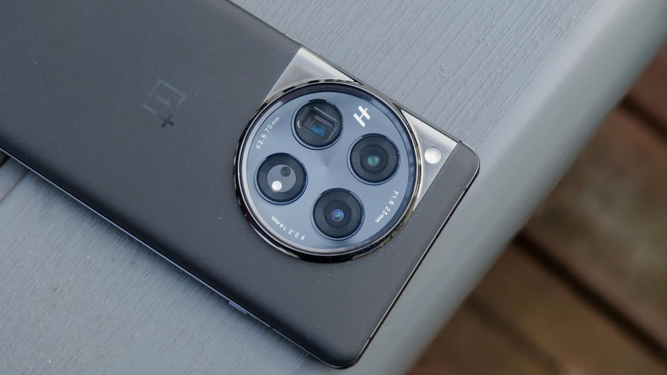 OnePlus 12 held in the hand.