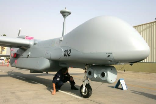 An Israeli Air Force drone named the Heron is inspected by a pilot. Global demand for unmanned aerial vehicles (UAVs), better known as drones, is heating up as armed forces invest in new systems to boost their ability to carry out reconnaissance and strikes without putting soldiers' lives in danger