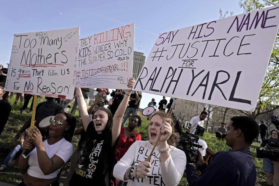 People gather at a rally to support Ralph Yarl, Tuesday, April 18, 2023, in Kansas City, Mo. Yarl, a Black teenager, was shot last week by a white homeowner when he mistakenly went to the wrong address to pick up his younger brothers. (AP Photo/Charlie Riedel)