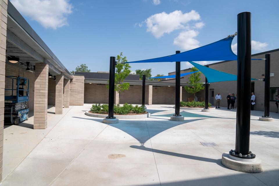 This outdoor warming area and sleeping space for the homeless includes overhead heating elements and heated sidewalks at the new Pope Francis Center Bridge Housing Campus on Detroit's west side on Wednesday, May 22, 2024.