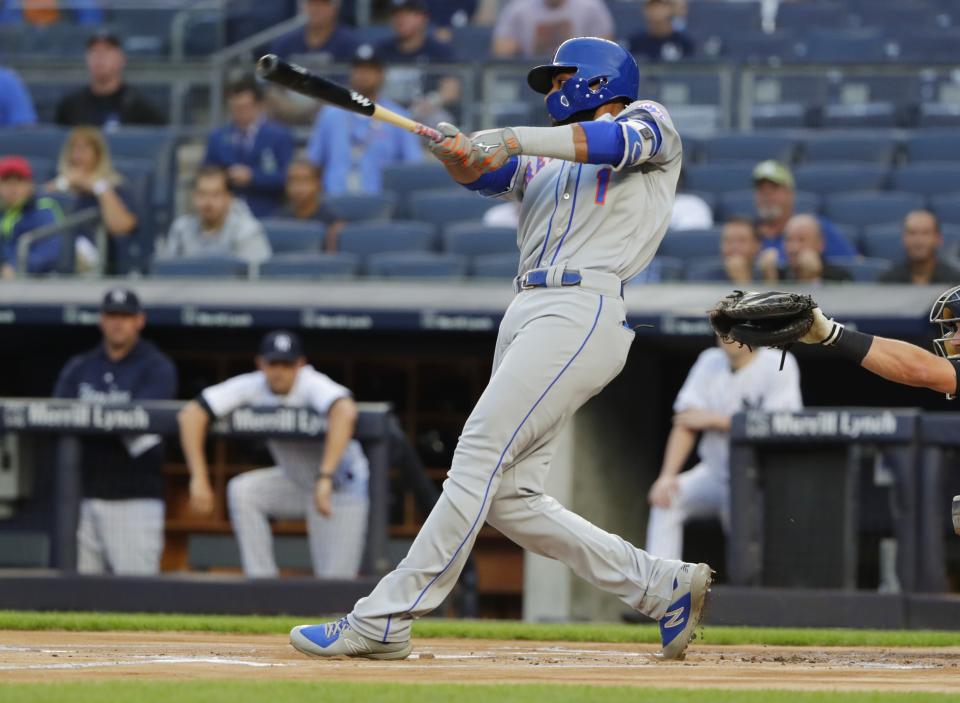 New York Mets' Amed Rosario hits a home run during the first inning of a baseball game against the New York Yankees Monday, Aug. 13, 2018, in New York. (AP Photo/Frank Franklin II)