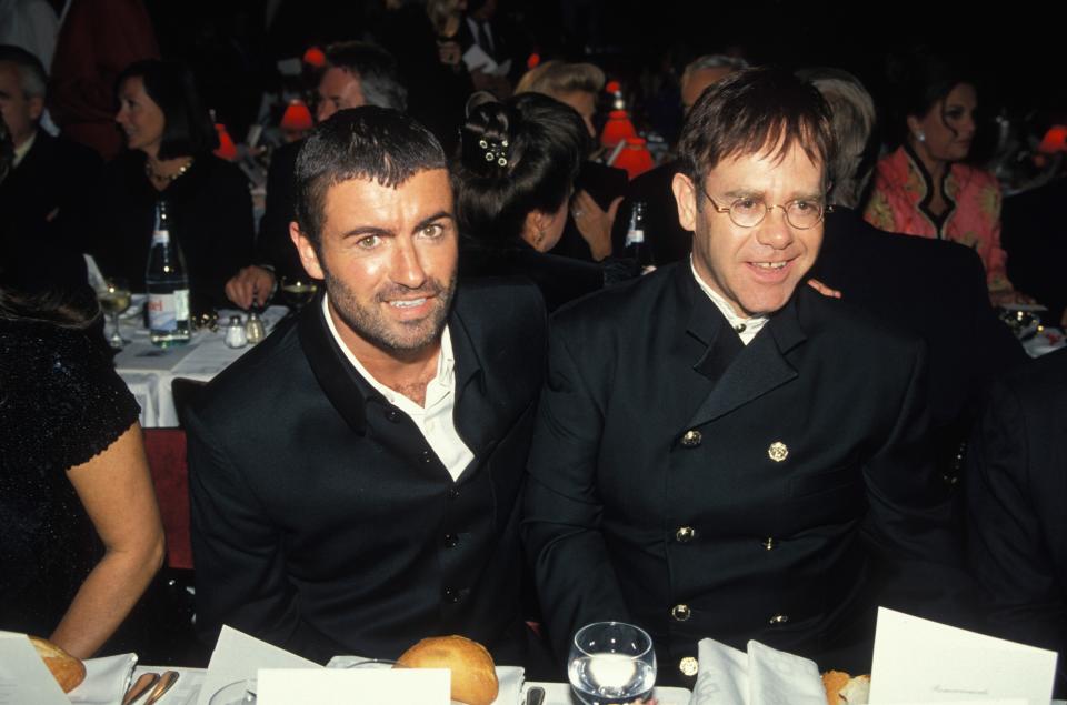 George Michael and Elton John at party against AIDS at the Moulin Rouge cabaret on October 11, 1994 in Paris, France. (Photo by Alain BENAINOUS/Gamma-Rapho via Getty Images)