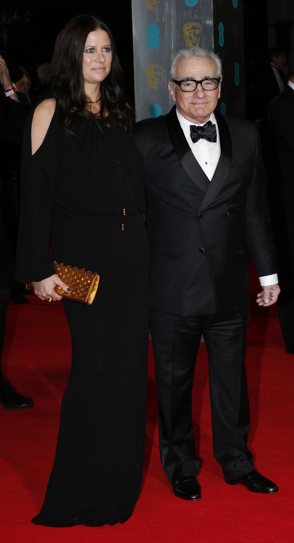 Director Martin Scorsese and producer Emma Koskoff arrive at the British Academy of Film and Arts (BAFTA) awards ceremony at the Royal Opera House in London February 16, 2014. REUTERS/Suzanne Plunkett (BRITAIN - Tags: ENTERTAINMENT)