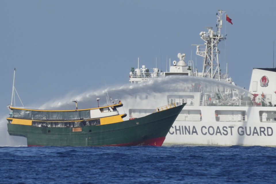 Philippine resupply vessel Unaizah May 4 is hit by Chinese coast guard water canon blast causing injuries to multiple crew members as they tried to enter the Second Thomas Shoal, locally known as Ayungin Shoal, in the disputed South China Sea Tuesday, March 5, 2024. Chinese and Philippine coast guard vessels collided in the disputed South China Sea and multiple Filipino crew members were injured in high-seas confrontations Tuesday as Southeast Asian leaders gathered for a summit that was expected to touch on Beijing's aggression at sea. (AP Photo/Aaron Favila)